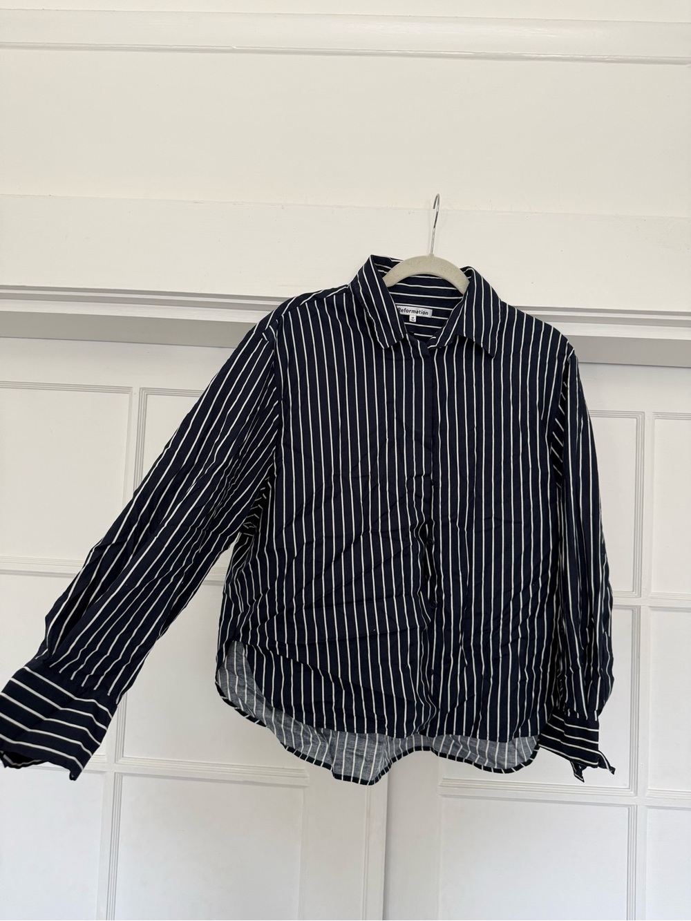 striped navy and white Reformation button down long sleeve size M